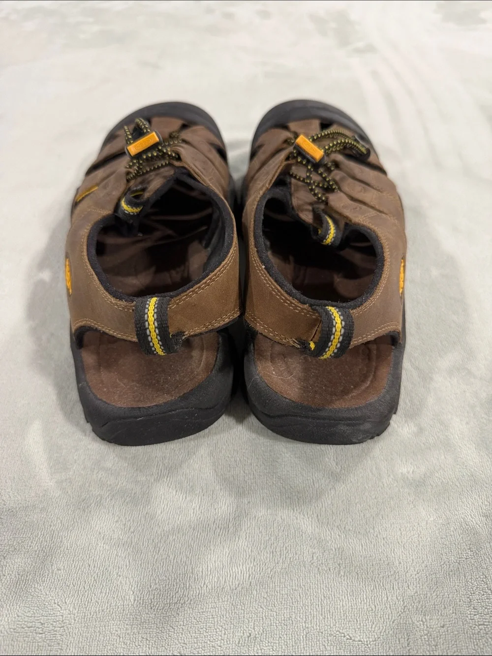 KEEN Brown and Black Men’s Closed-Toe Sandals with Yellow Accents. Never worn.
